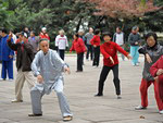 A group of elderly people practicing Tai Chi. Shanghai
