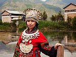 Population of China: The girl in national costume of Miao tribe