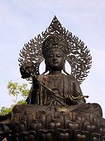 A bronze statue of Guan Yin in the large Chinese temple
