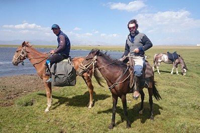 Horseback riding around Son-Kul Lake
