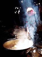 Tajik Woman making plov