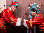 The traditional Chinese wedding dress of bride and groom