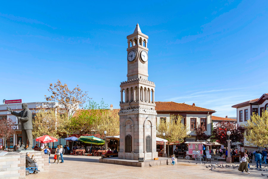 Clock Tower in front of Cafes in Hamamönü, Turkey Clock Tower in front of Cafes in Hamamönü, Turkey