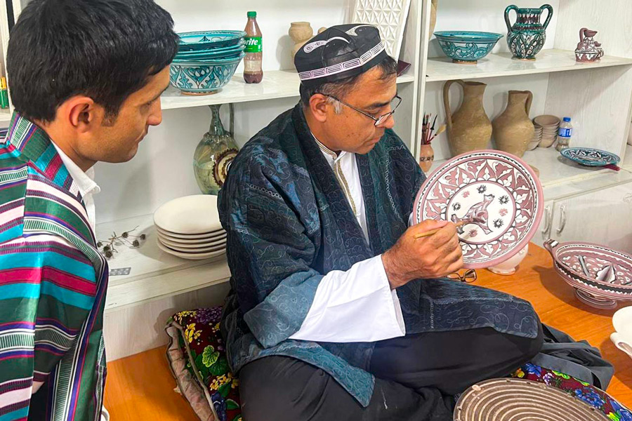 Vakhobjon Buvayev with his students in his own workshop-studio