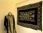 Clothing decorated with gold embroidery