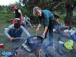 Cooking dinner on open-fire